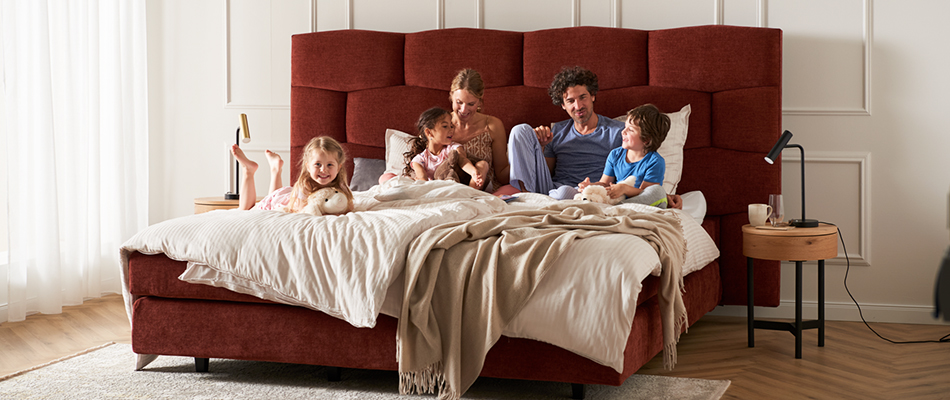 Familie ins Bett