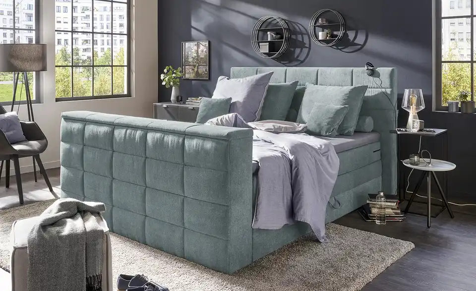 uno TV-Boxspringbett Dillon mit motorischer TV-Halterung, in Wohnsituation