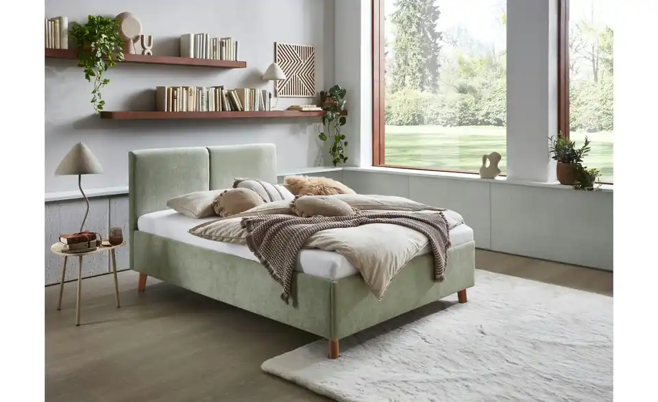 Polsterbett Piano in hellgrün, in Wohnsituation